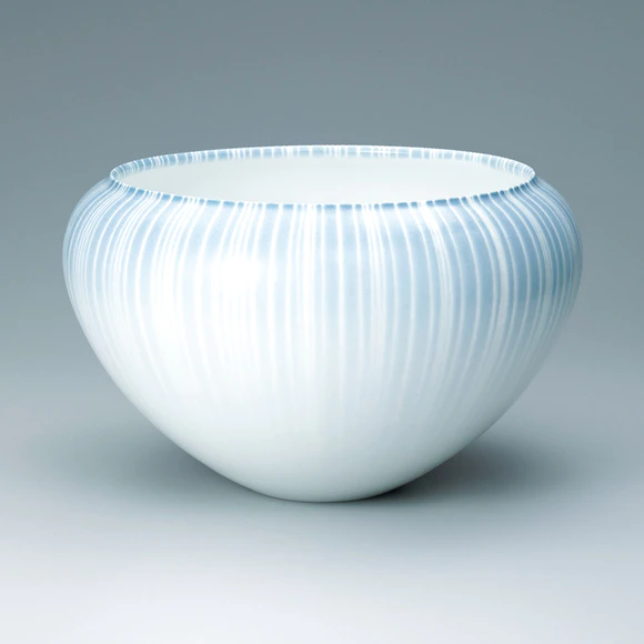 Deep bowl with glossy colored glaze. “Creation”