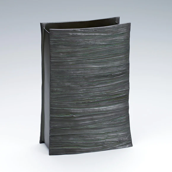 Copper flower vessel cast in lost wax casting method. “Shade of trees”