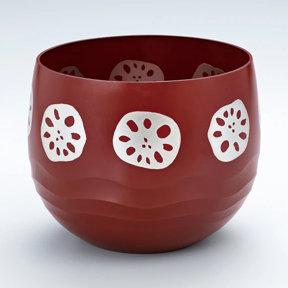 Forged flower vessel with design in cutout inlay. “Lotus root”