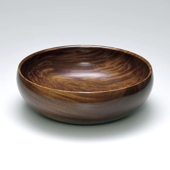 Bowl of zelkova wood finished in wiped urushi.