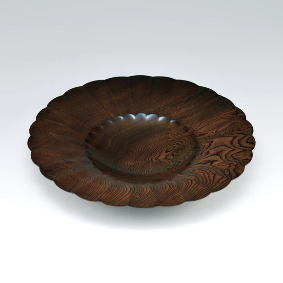 Plate of zelkova wood finished in wiped urushi.