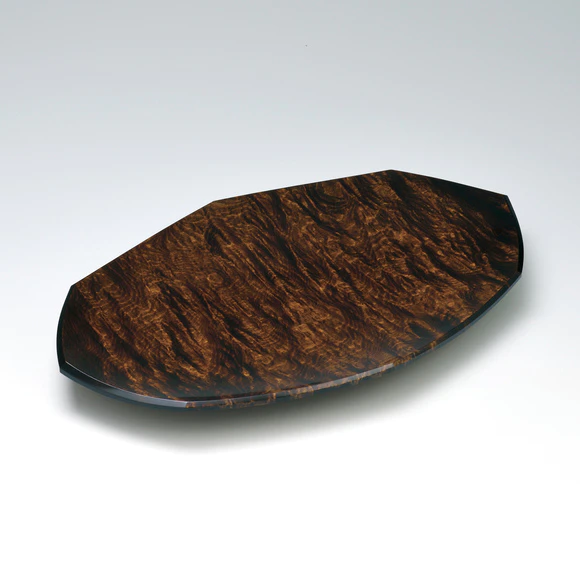 Plate of horse chestnut wood finished in wiped urushi.