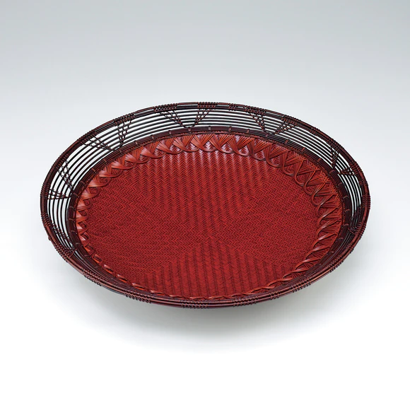 Woven dish. “The rise and fall of the tide”