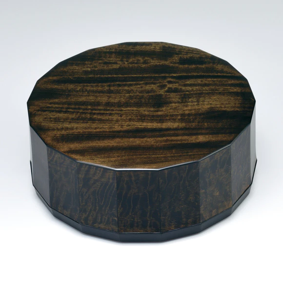 Covered food box of horse chestnut wood finished in wiped urushi.