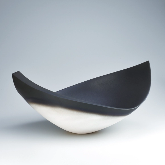 Vessel with black decoration. “So”