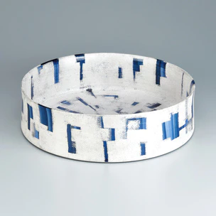 Bowl with underglaze blue and silver design.