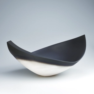 Vessel with black decoration. “So”