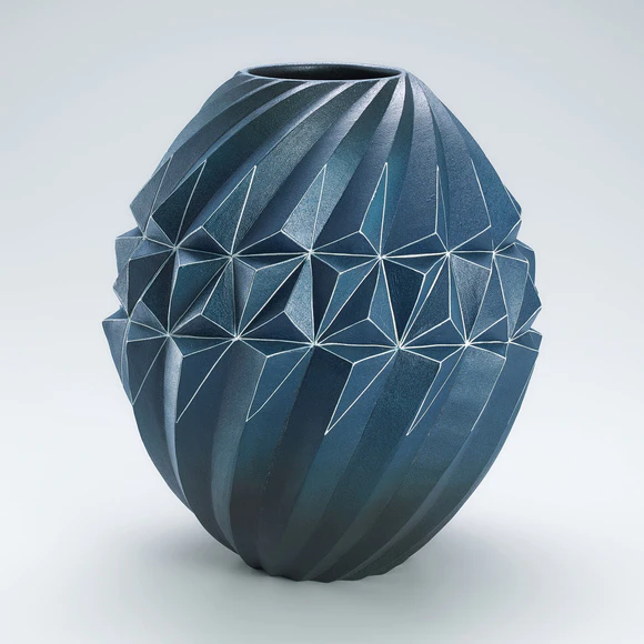 Gradated blue jar with geometrical design.