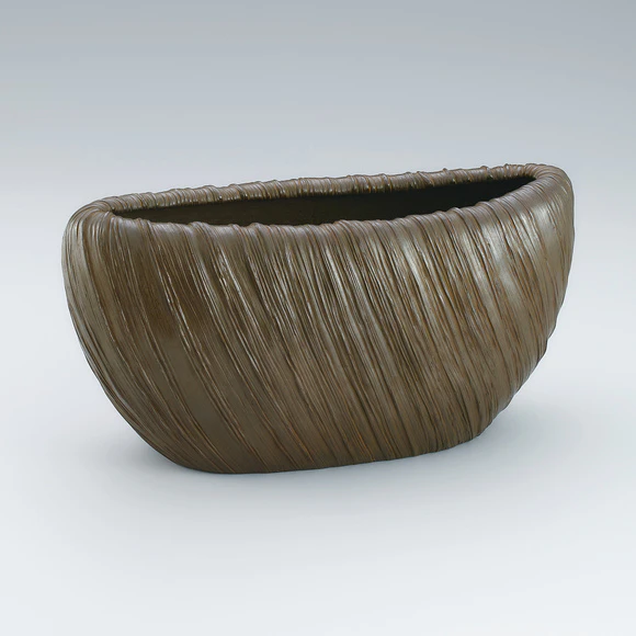 Copper flower vessel cast in lost wax casting method.