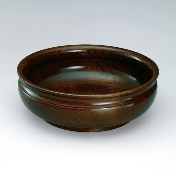 Bowl of zelkova wood finished in wiped urushi.