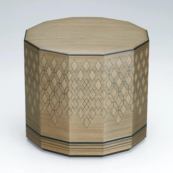 Twelve-sided box of jindai cedar wood with design in colored wood line inlay.