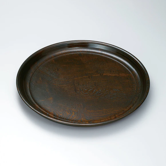 Plate of zelkova wood finished in wiped urushi.