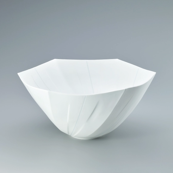 Flower vessel with glaze inlay.