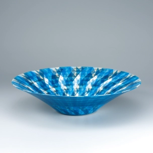 Bowl with design in overglaze transparent blue enamel and silver.