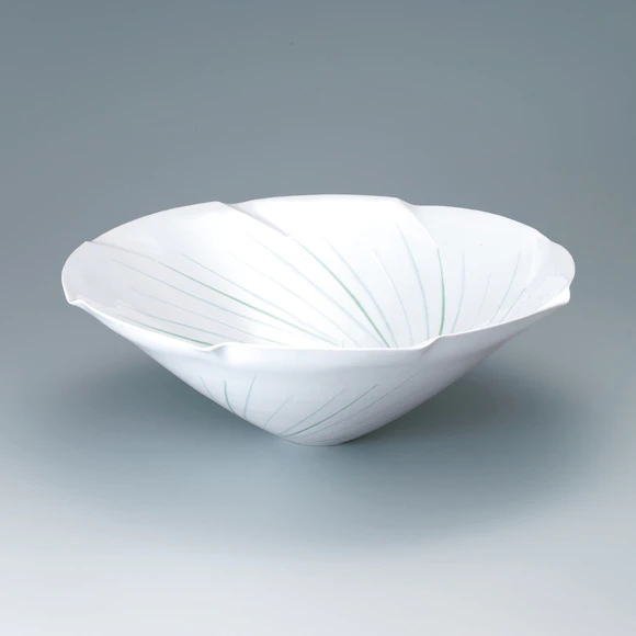 Bowl with engraved design and glaze inlay.