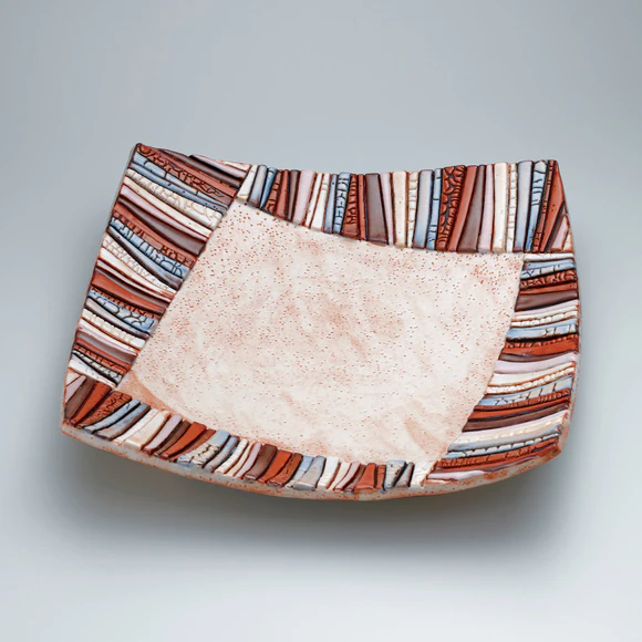 Shino square dish with colored decoration.