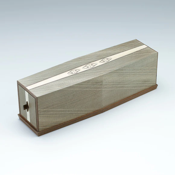 Small chest of drawers made of jindai cedar wood with floral diamond design.