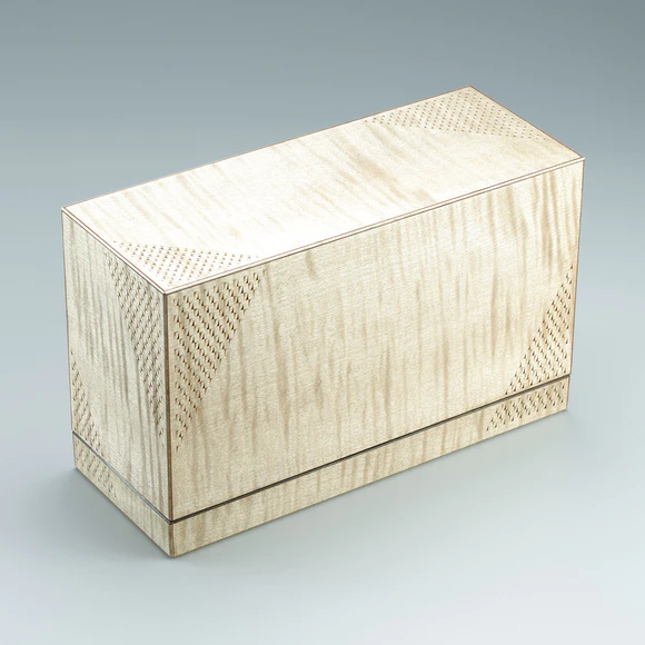 Box of maple wood with carved design.