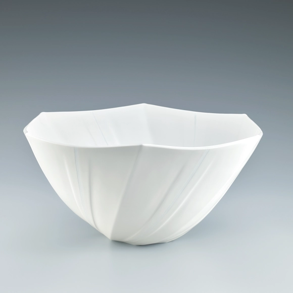 Flower vessel with glaze inlay.