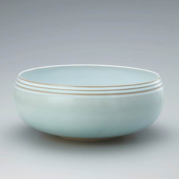 Bowl with pale blue glaze.