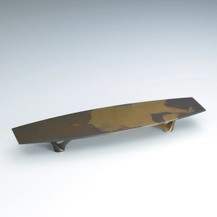 Long square tray cast in two different metals.