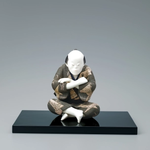 “Can’t come up anything”. Formed with tōso over wooden core and dressed in kimekomi.
