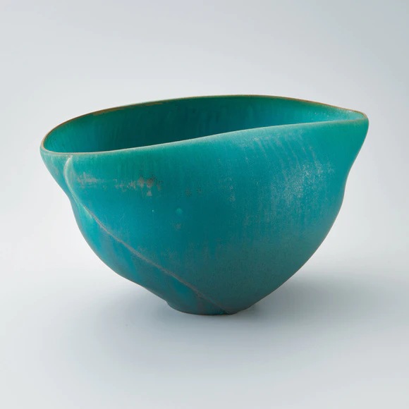 Bowl with green glaze.