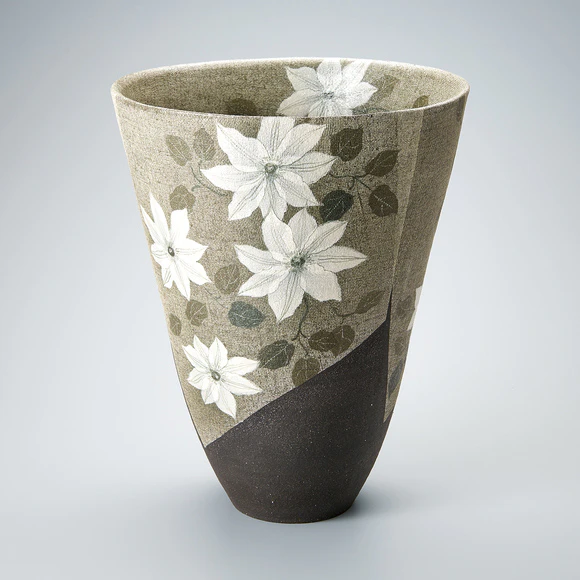 Flower vessel with clematis design.