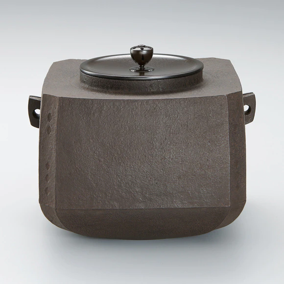 Square tea ceremony kettle with beveled corners.