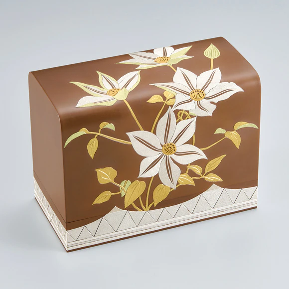 Copper box with clematis design in inlay.