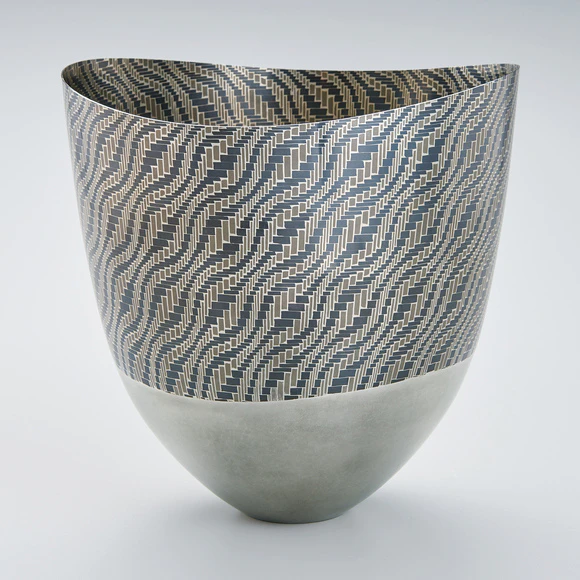 Vessel made of braided wire joined by heat welding method. “Thousand waves”