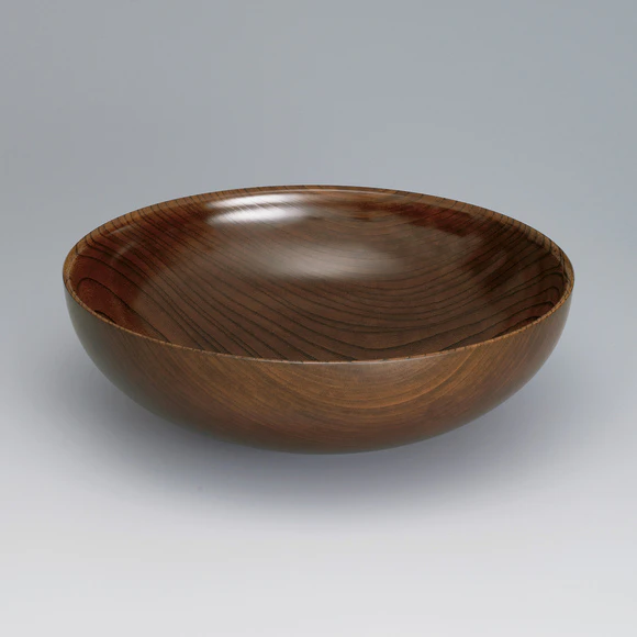 Bowl of zelkova wood finished in wiped urushi.