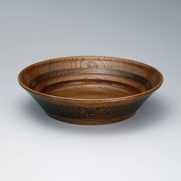 Bowl of zelkova wood with decoration by lathe work.