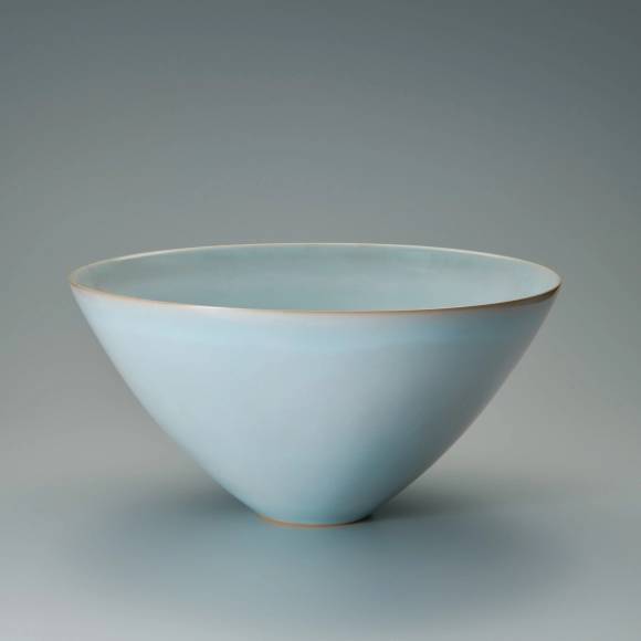 Bowl with pale blue glaze.