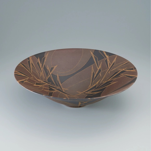 Bowl with black glaze in kakewake style and inlay.