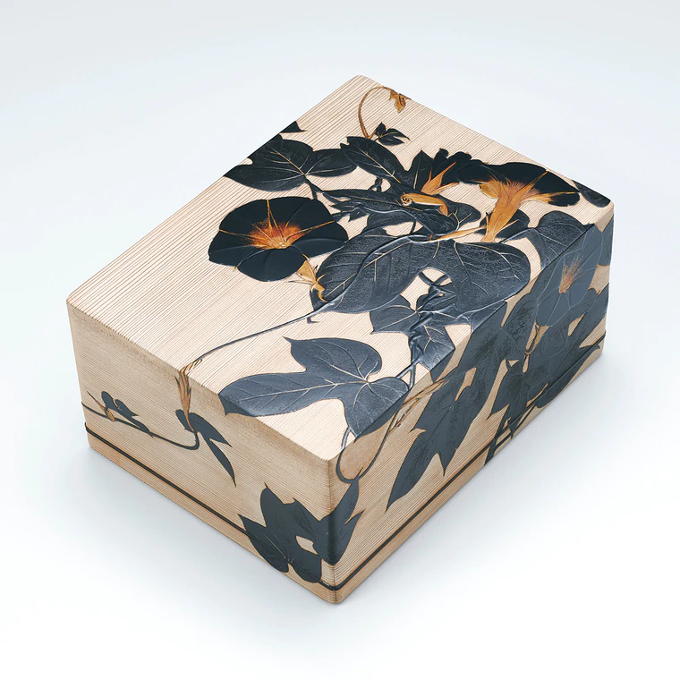 photo Box with design in makie on plain wood surface. “Morning glory”