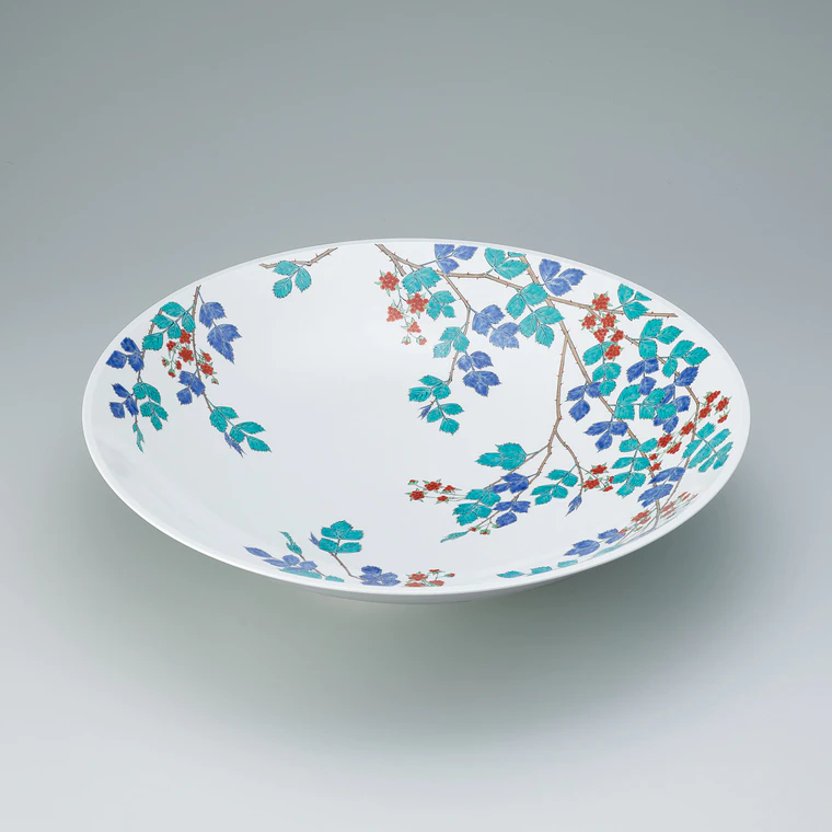 photo Bowl with strawberry design on milky white background.
