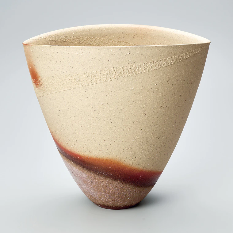 photo Bizen flower vessel with raised design.