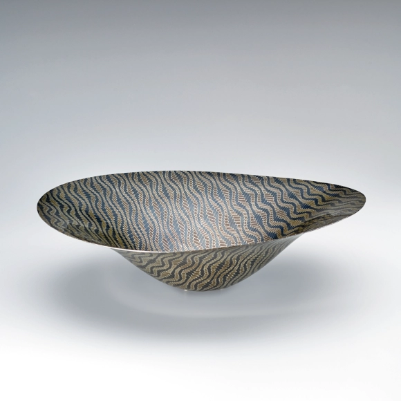 Vessel made of braided wire joined by heat welding method. “Races”