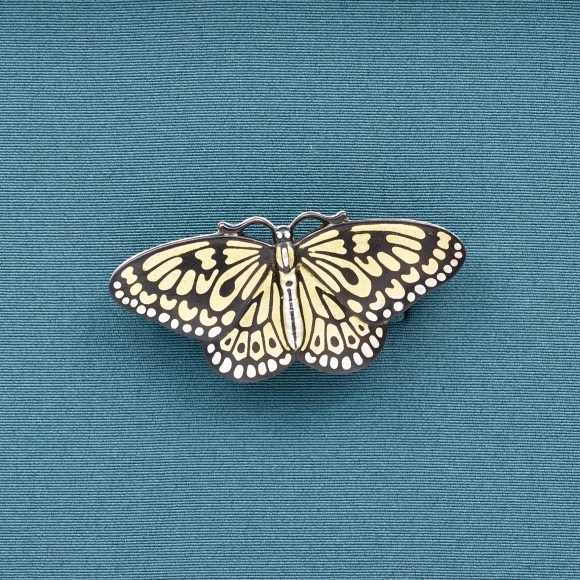 Metal fitting in shape of butterfly. “Paper kite butterfly”