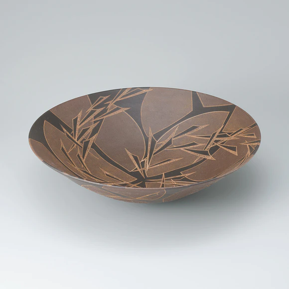 Bowl with black glaze in kakewake style and inlay.