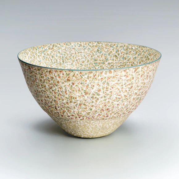 Bowl with tangled strings design in colored slip.