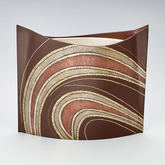 Iron flat flower vessel with design in layered damascene inlay. “A-un”