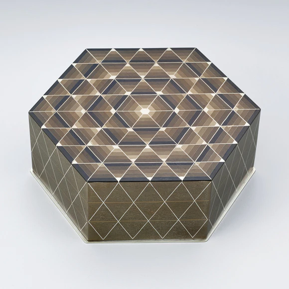 Box of shibuichi joined by heat welding method. “Light trail”