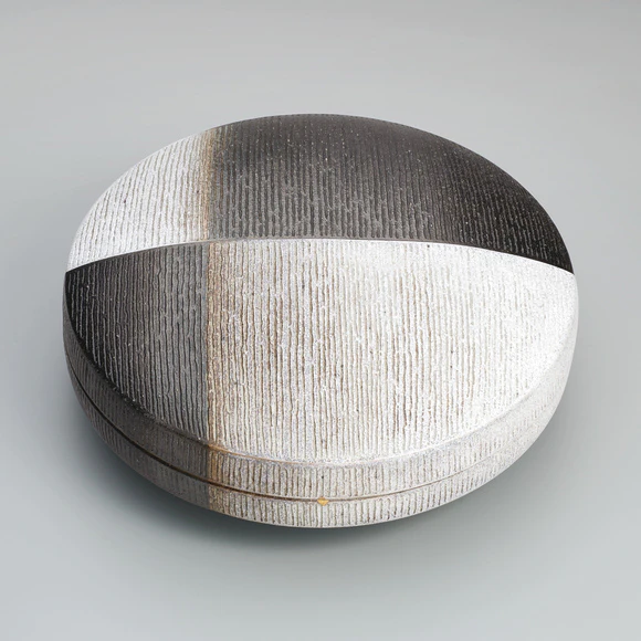 Box incised line design. “Time”