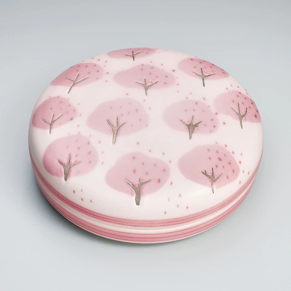 Box with tree design in red glaze.