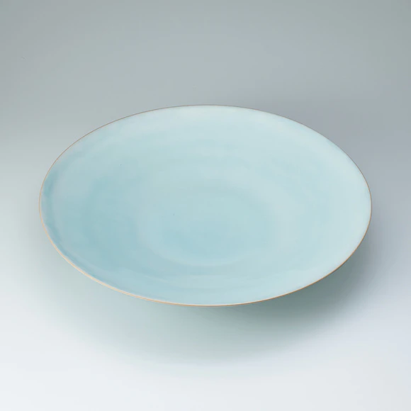 Dish with pale blue glaze.