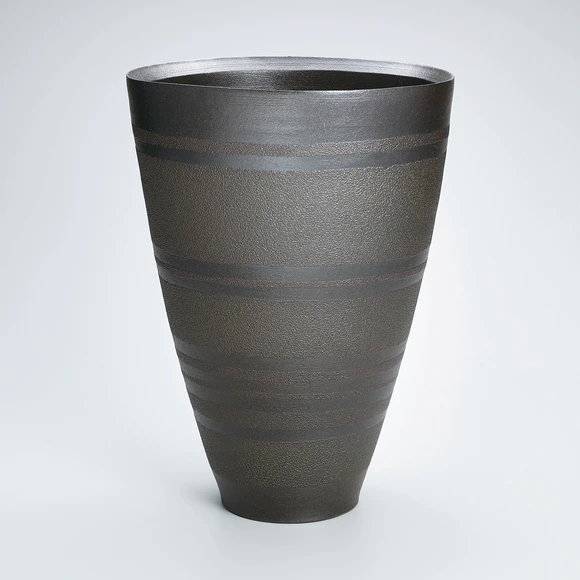 Wide mouthed flower vessel with decorative glaze crawling.