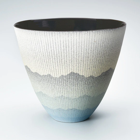 Bowl with ridgeline design in colored slip.