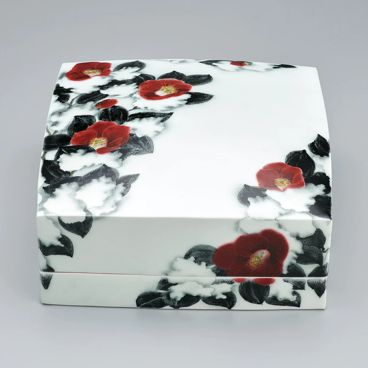 photo Square box with snow and camellia design in colored glaze and underglaze copper